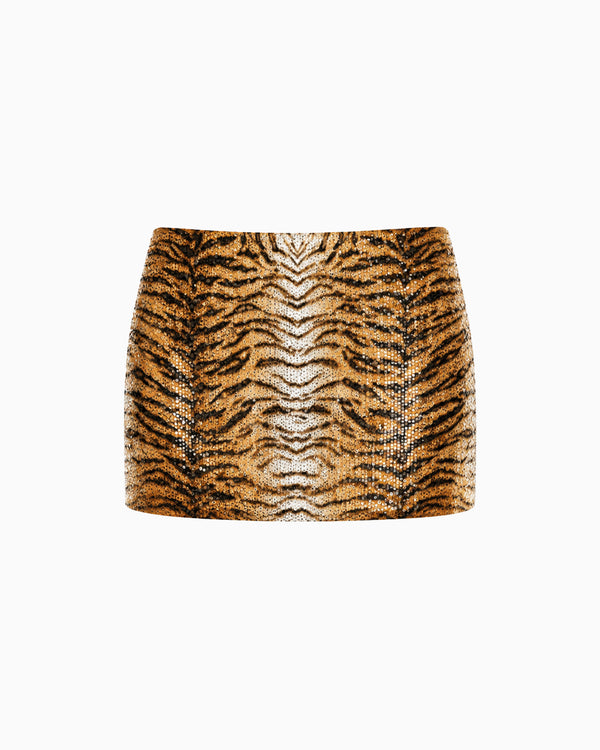 Mini saia de paetês com estampa animal print de tigre em dourado e preto, peça sozinha