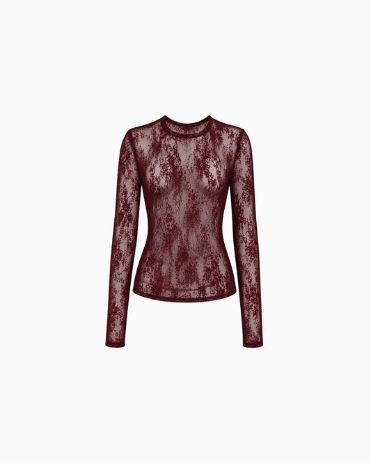 Blusa Manga Longa Renda Haze vinho em renda floral transparente, gola redonda e manga longa, peça sozinha