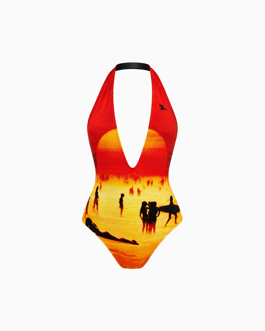 Maiô frente única com estampa de pôr do sol na praia em tons de vermelho e amarelo, peça sozinha