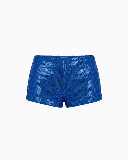 Mini Shorts Paetê Aura na cor azul, peça solta vista de frente, todo em paetês brilhantes com cintura baixa