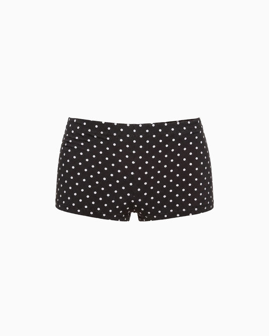 Mini Shorts Poá preto com estampa de poás brancos, vista frontal da peça