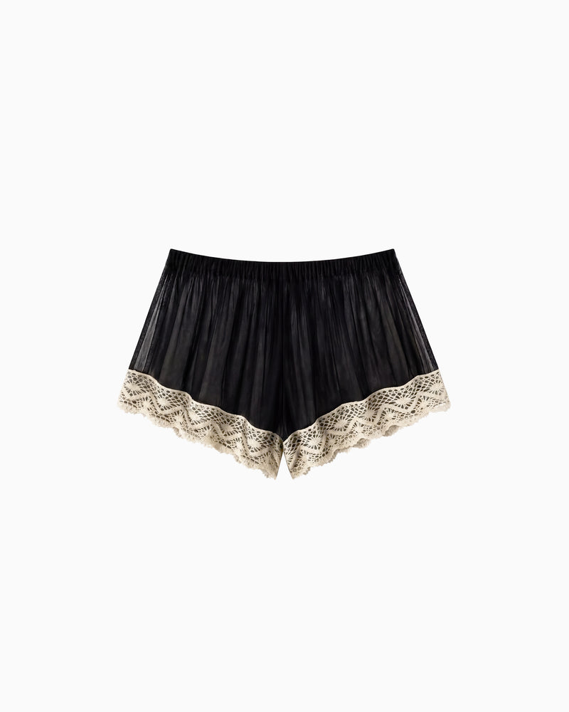 Shorts Tule Com Renda preto, com cós elástico e acabamento em renda bege, vista frontal