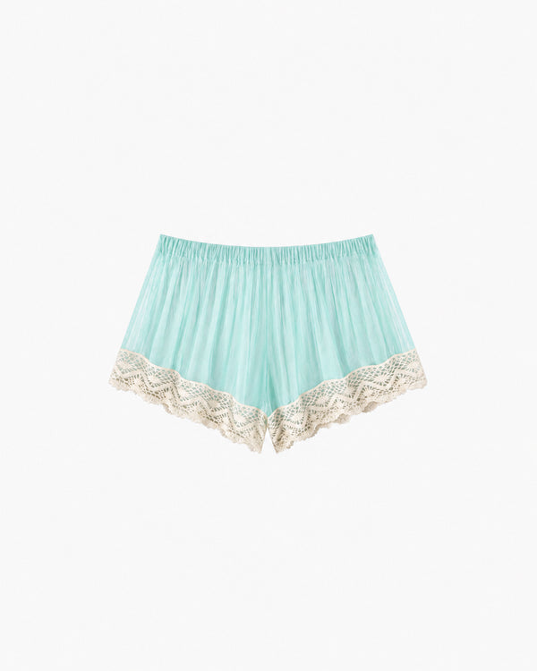 Shorts Tule Com Renda verde-água, com cós elástico e acabamento em renda bege, vista frontal